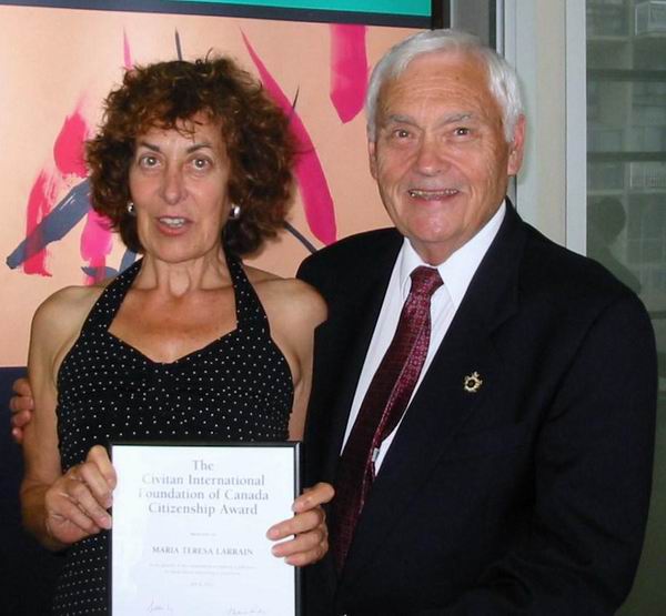 Past Chair Fred Chalk presenting bursary to Maria Teresa Larrain Past Chair Fred Chalk presenting bursary to Maria Teresa Larrain